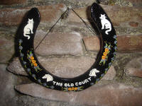 Hand Painted Horseshoes by Mary Edmunds